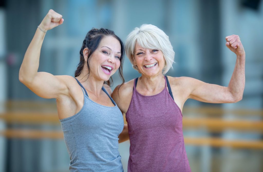 Confident women over 50 strength training as part of hormone balance after 50 lifestyle guide women follow for metabolism and energy support