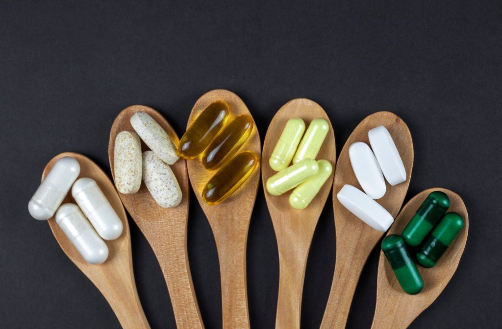 Dietary supplements including capsules and omega-3 softgels for hormone balance after 50 lifestyle guide women may consider